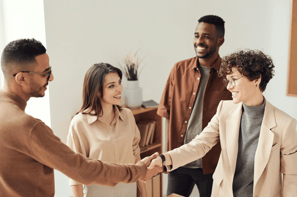 How To Refine Your Working Strategy This Year People Working Together in Office