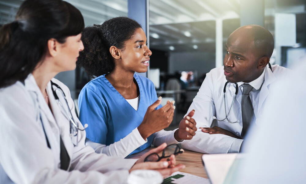 Strategies for Advancing Your Healthcare Career A group of healthcare professionals discussing