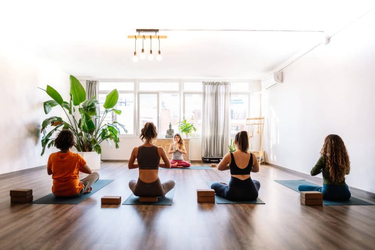 Starting a Wellness Business Today: What Actually Makes It Work Small Group Having a Yoga Class