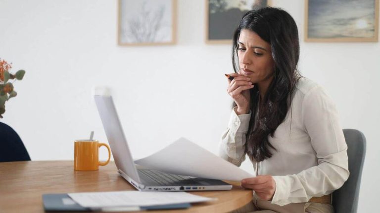 Why Capable Women Still Second-Guess Themselves Woman reflecting on her Work and Worrying