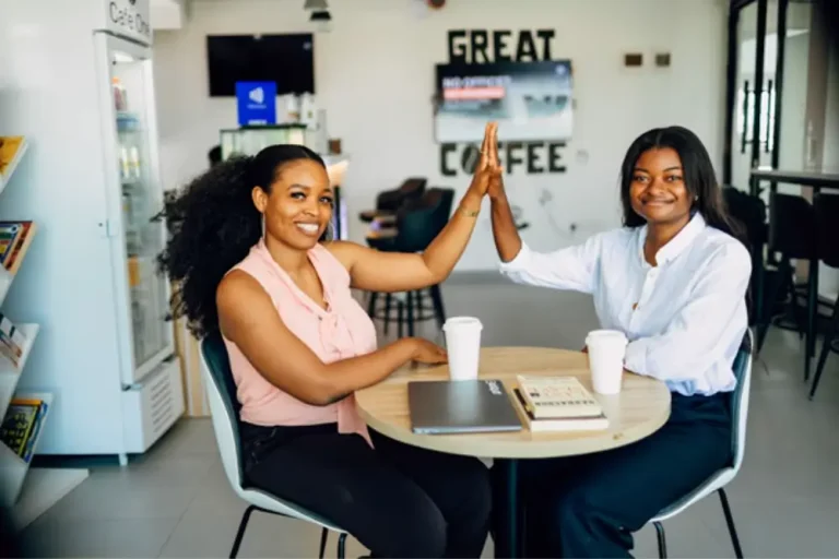 How to Build a Stronger Business Mindset Happy Women High Fiving