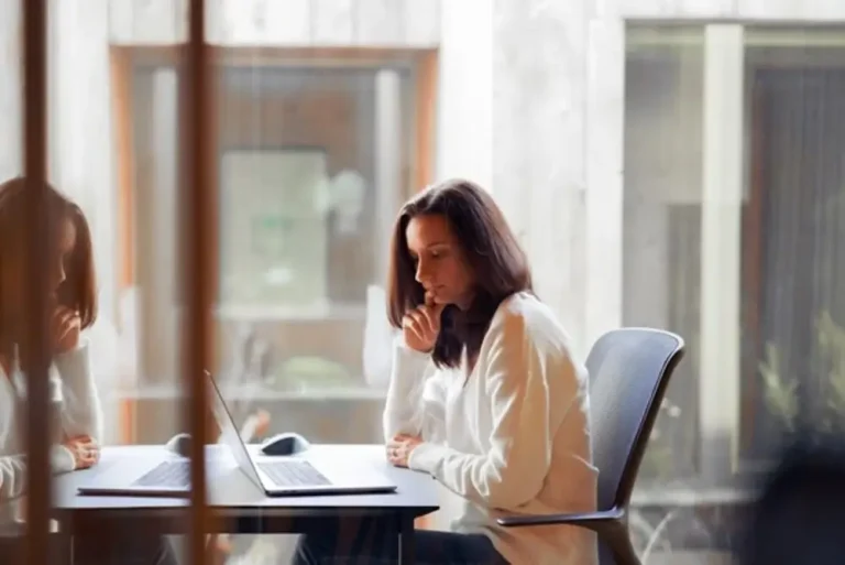 Workplace Harassment: Recognizing It and Responding Effectively Harrassed Woman over laptop
