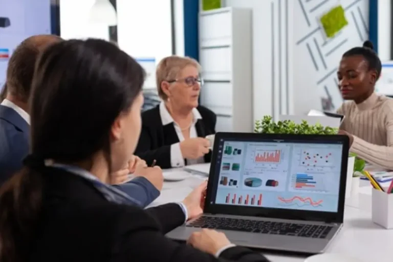 Greenly vs Sweep: Compare & Review Meeting with Open Laptop